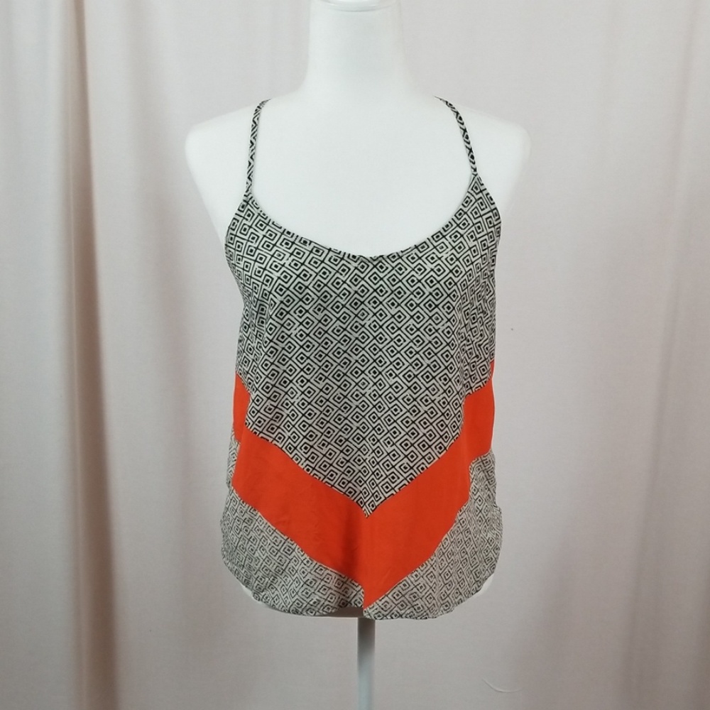 Old Navy black, white, and orange patterned top.